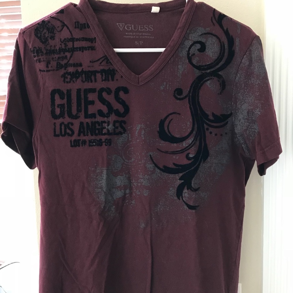 Guess t-shirt with design on the front.
